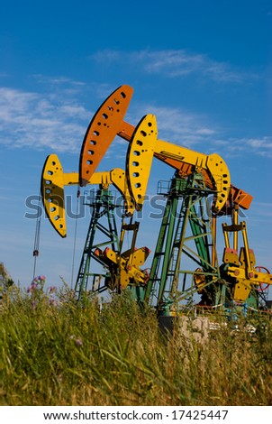 oil pump in autumn field