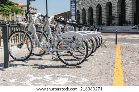 Verona, Italy - July 2012: Public Bicycles in Piazza Bra in Verona. Verona Bike is a bicycle sharing scheme introduced in 2012.