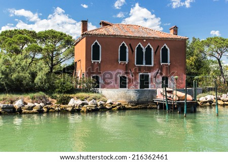 Venice / Italy - July 2012: Deserted island near the island of Burano, a lonely house in which lived fishermen