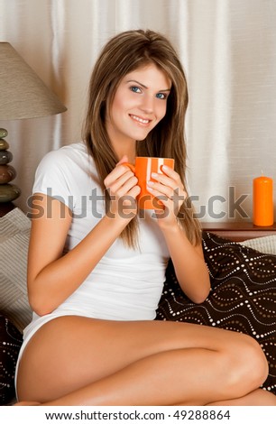 Young beauty woman with a mug