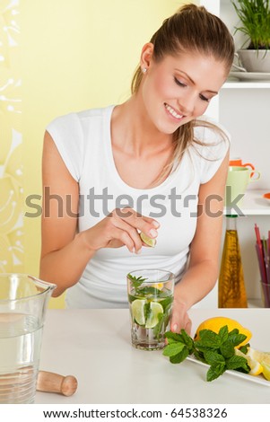 Beauty, young girl making lemon water