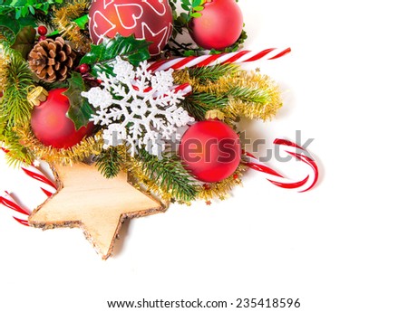 Christmas decoration with balls, ice star and sticks on white background