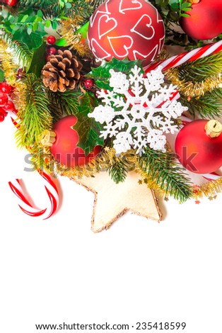 Christmas decoration with balls, ice star and sticks on white background