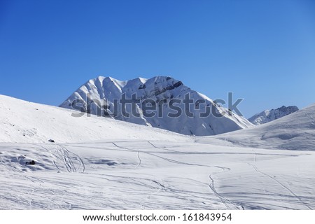 Off piste slope at nice sun day. Georgia, ski resort Gudauri. Caucasus Mountains.