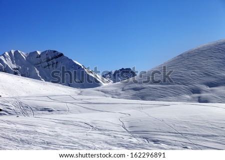 Off piste slope at nice winter day. Georgia, ski resort Gudauri. Caucasus Mountains.