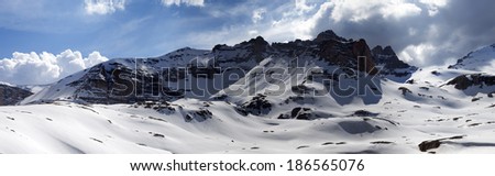 Panorama of snowy mountains at sun day. Turkey, Central Taurus Mountains, Aladaglar (Anti-Taurus), plateau Edigel (Yedi Goller)