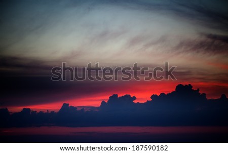 Dark sunrise sky on lake