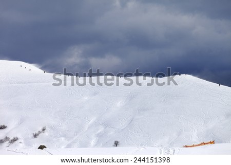 Off-piste slope and gray sky in bad weather day. Caucasus Mountains, Georgia. Ski resort Gudauri.