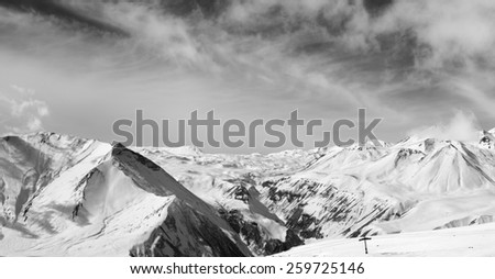 Black and white panorama of winter snowy mountains. Caucasus Mountains, Georgia.