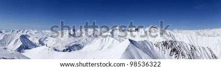 Panorama of winter mountains. Caucasus Mountains, Georgia, region Gudauri. View from ski slope