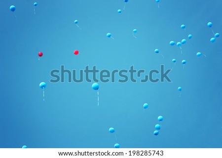 many balloons in the blue sky