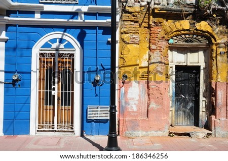New versus old colonial buildings, side by side in Mazatlan, Mexico
