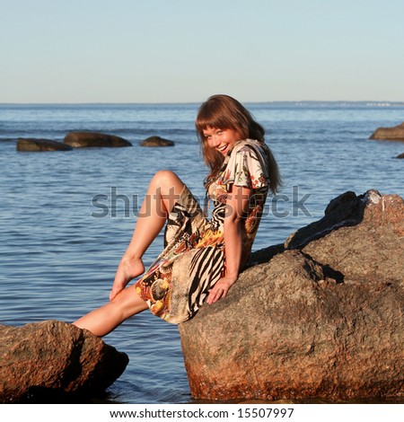 Young lady flirt near the sea
