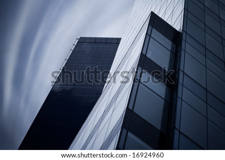 Detail of modern skyscraper. Psychedelic sky.