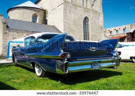  18 American Beauty Car Show Showing Blue 1958 Cadillac Coupe De Ville 