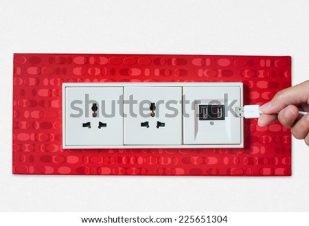 Woman hand plug USB Wall socket/outlet plate.