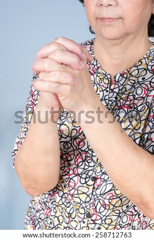 Old wrinkle woman Hands, senior folded hands together