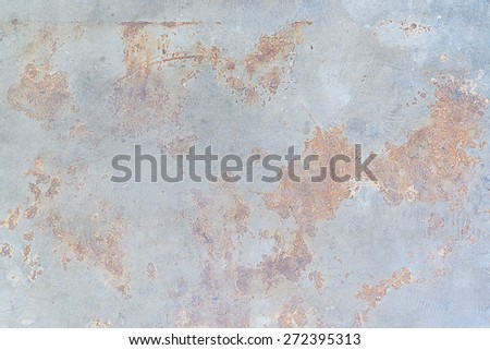 Grunge brown rust stains on polished old grey concrete floor.