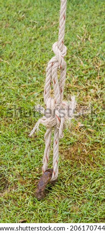 Knot the rope attached to the steel.