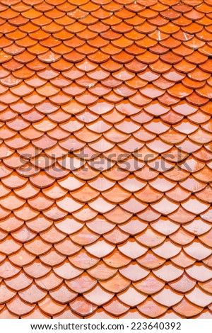 Close up, orange roof top tiles on temple at thailand