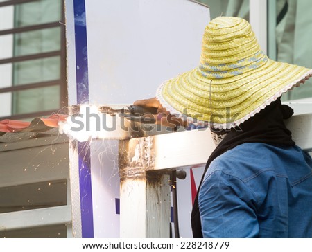 Man work not protection for steel pillar welding.