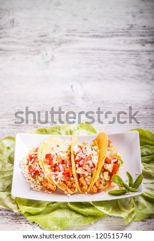 Tacos with chicken and tomato salsa