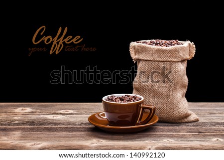 Cup of coffee with coffees sack