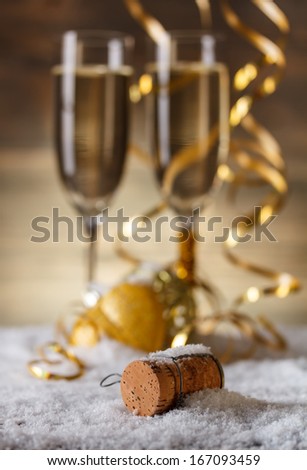 New Year\'s concept with champagne cork and glasses