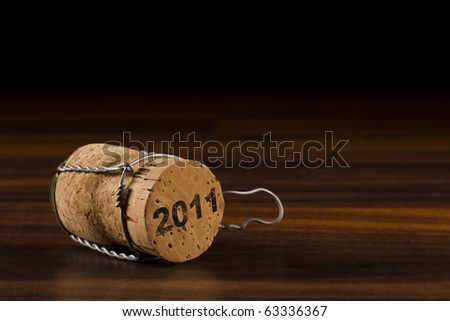 champagne cork in black selective focus