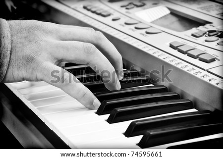 artist hands of a piano player