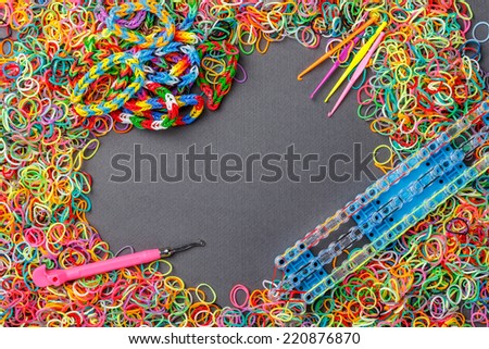 Colorful of elastic rainbow loom bands tool.