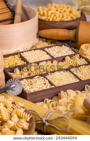 Different kinds of italian pasta in wooden box