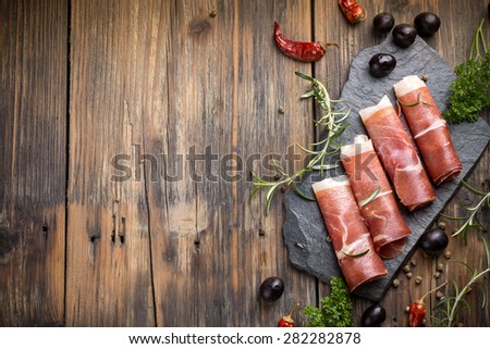 Top view of sliced prosciutto with space for your text