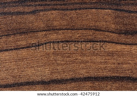 Closeup picture of wood texture used in furniture manufacturing.