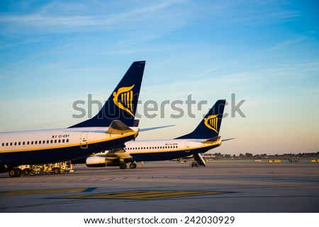 BARCELONA, SPAIN - JANUARY 02, 2015: Ryanair symbol on airplane tail parked Barcelona airport. Ryanair is an Irish airline.