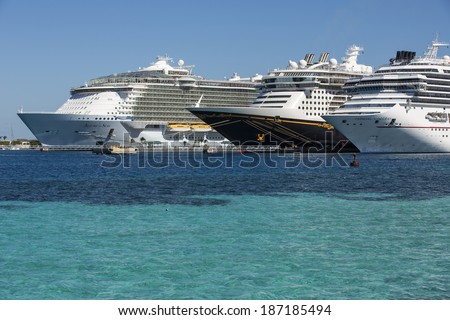 NASSAU, BAHAMAS - JANUARY 20: Cruise ships on pier in Bahamas port of call, on Jan. 20, 2014. Cruises to the Bahamas are abundant as the majority of cruise ships include Nassau in the itinerary.