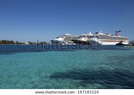 NASSAU, BAHAMAS - JANUARY 20: Cruise ships on pier in Bahamas port of call, on Jan. 20, 2014. Cruises to the Bahamas are abundant as the majority of cruise ships include Nassau in the itinerary.
