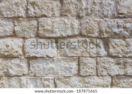 Part of stone wall at a medieval fortress in southern Europe.