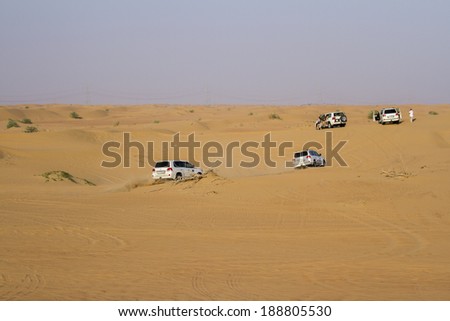 DUBAI, UAE - October 30 - Desert safari, also called dune bashing, in DUBAI, UAE on October 30, 2013. Desert safari is a popular activity among tourists in Dubai.