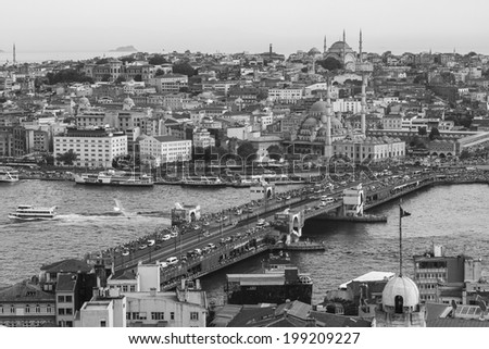 Istanbul, Turkey - May 2: Fishermen on Galata bridge of Istambul on May 2, 2012 in Istanbul, Turkey. Galata Bridge is a bridge that crosses the Golden Horn in Istanbul.