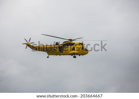 Keswick, England - JUNE 15: Rescue helicopter of the Royal Air Force in flight near Keswick, England, on June 15, 2014.