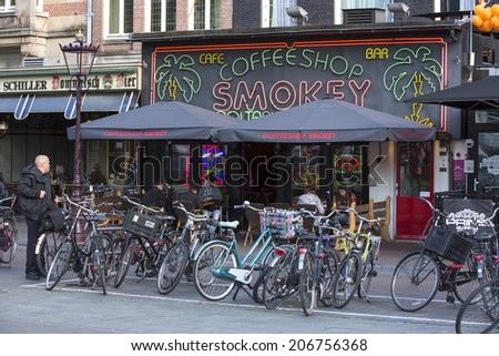 Amsterdam, Netherlands - June 29: Bicycles in the city of Amsterdam, Netherlands on June 29, 2014. The locals use the bicycle as a preferred method of transportation.