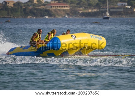 Zakynthos, Greece - June 30: Tourists engaging in water sports activities in Zakynthos, Greece on June 30, 2014.