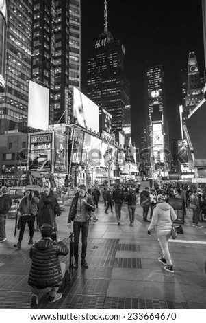 Manhattan, NYC - November 3: View of tourist packed Times Square by night, in Manhattan, NYC on November 3, 2014.