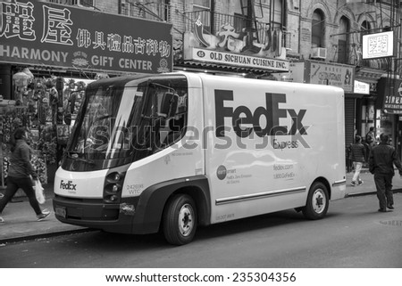 New York City, November 4: Electric FedEx truck delivers packages on November 4, 2014 in New York City. FedEx is one of largest package delivery companies worldwide.