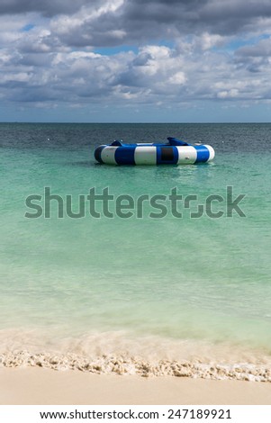 View of a water trampoline on a tropical beach in the Caribbean.