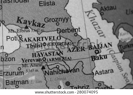 Map view of Georgia, Azerbaijan and Armenia on a geographical globe. (black and white)