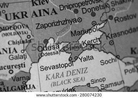 Map view of Crimea on a geographical globe. (black and white)
