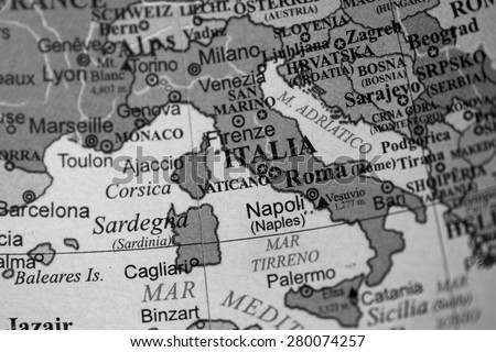 Map view of Italy on a geographical globe. (black and white)