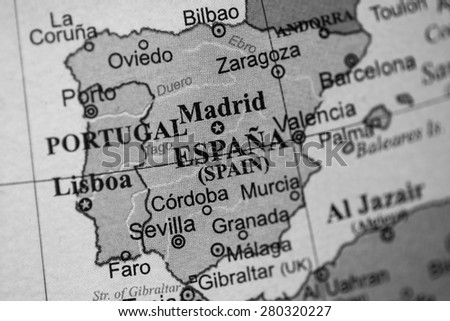 Map view of Spain on a geographical globe. (black and white)